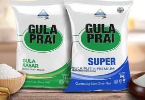 Two MSM Gula Prai 1 kg sugar packs side by side: Gula Kasar coarse grain sugar and Super white sugar